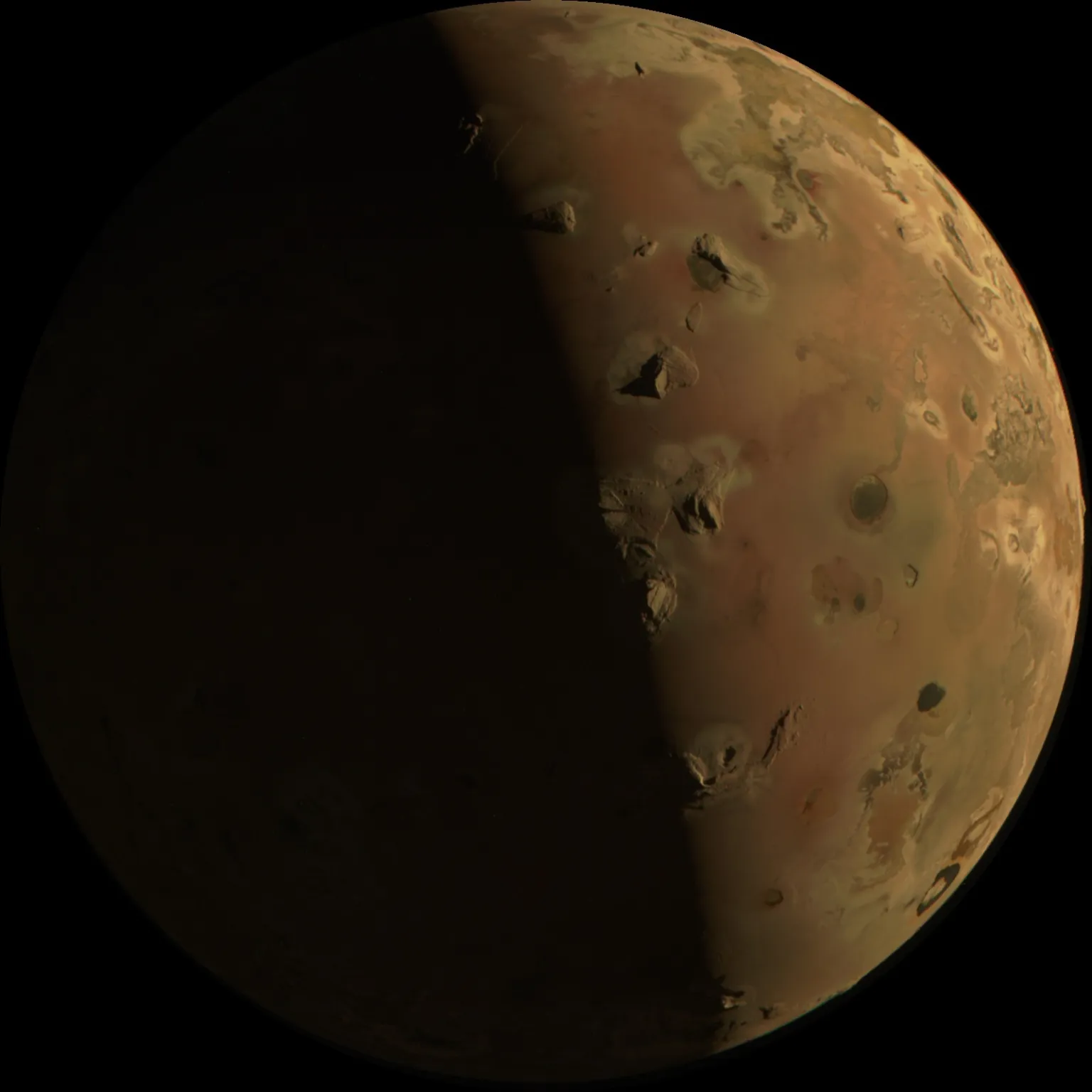 Jupiter's moon Io captured during a close approach by NASA's Juno spacecraft on Dec. 30, 2023.