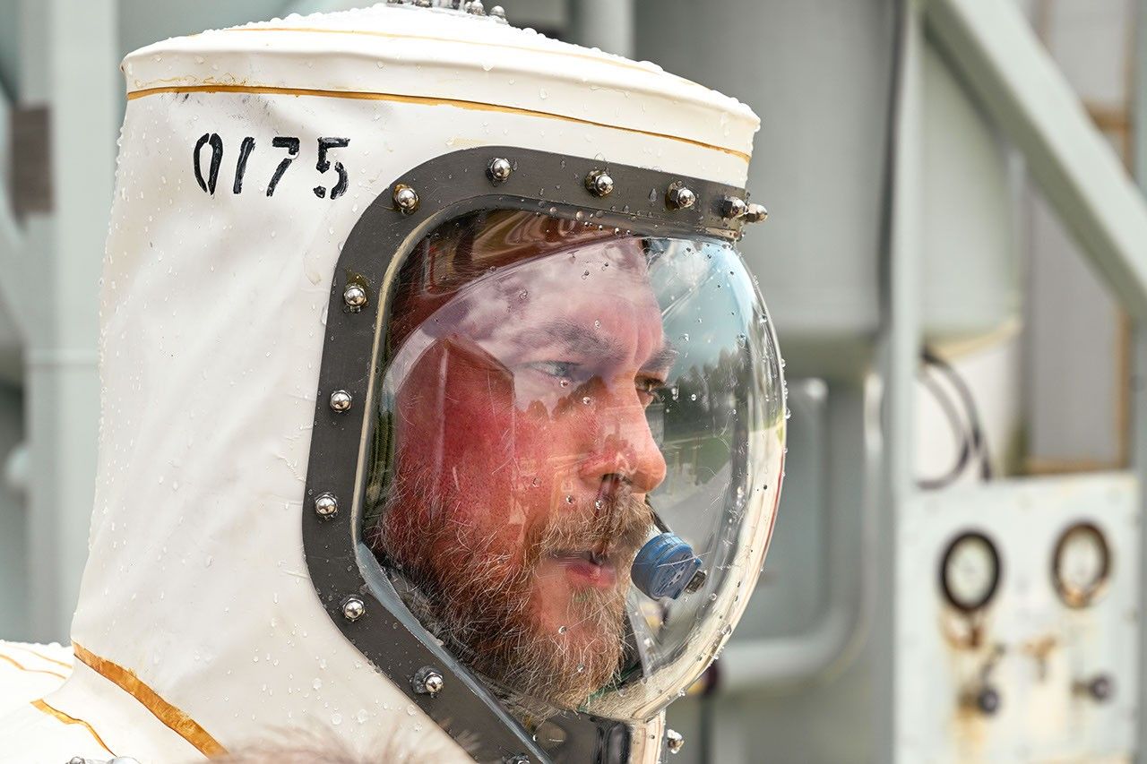 Billy Keim, a senior integration technician for Roman wears a Self-Contained Atmospheric Protective Ensemble (SCAPE) suit before performing propellant loading at KSC in Florida July 24, 2026. (Image Source: NASA | Sydney Rohde (Rocz))