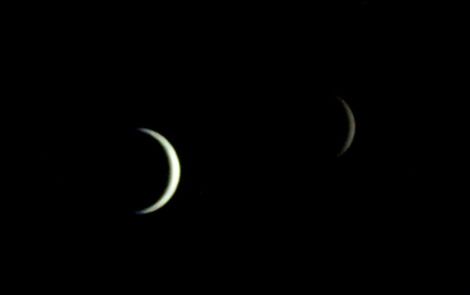 The Earth and the Moon photographed by NASA's ESCAPADE spacecraft in visible light, July 3, 2026.
