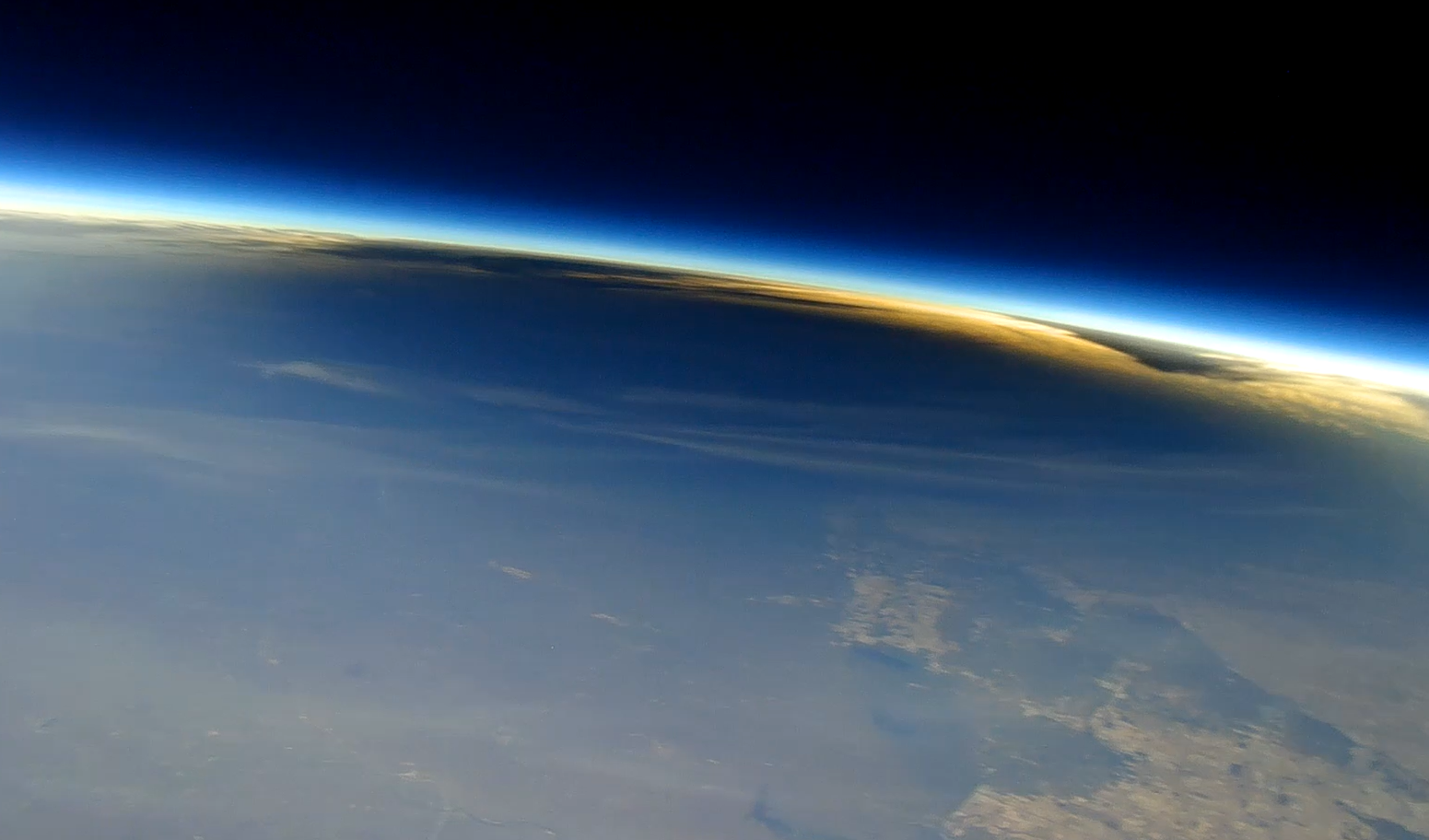 Picture of the Moon’s shadow on Earth during the total solar eclipse as seen from about 90,000 feet from a camera carried by a scientific balloon, April 8, 2024.