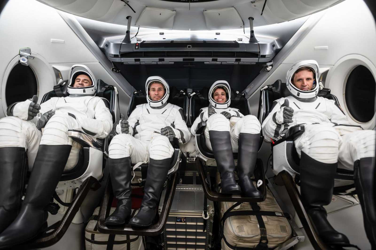 NASA’s SpaceX Crew-13 members are pictured in their pressure suits seated inside a mockup Dragon spacecraft during a preflight training session at the company’s headquarters in Hawthorne, California. From left are Roscosmos Sergey Teteryatnikov, NASA astronauts Luke Delaney and Jessica Watkins, and CSA (Canadian Space Agency) astronaut Joshua Kutryk. Credit: SpaceX