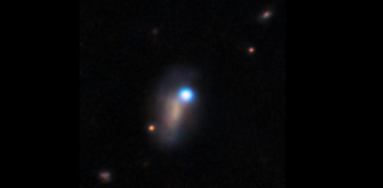 This image shows supernova SN 2026gzf, which appears as a bright blue point source in the upper right corner of the host galaxy.
