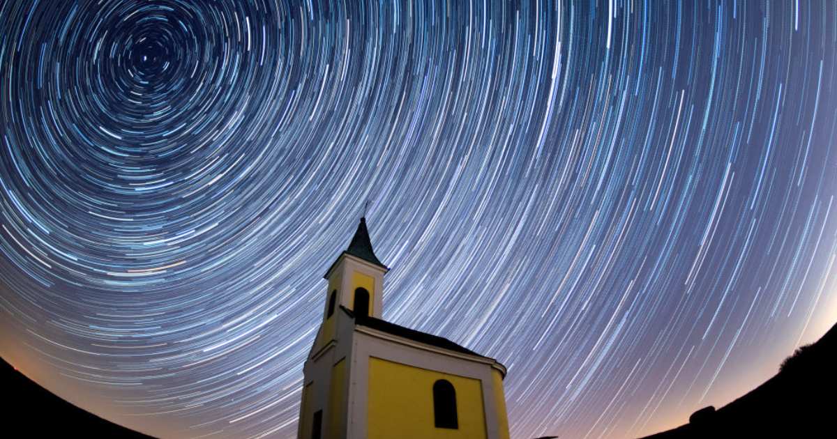 Startrails are seen during the Lyrids meteor shower over Michaelskapelle on April 21, 2020, in Niederhollabrunn, Austria (Cover Image Source: Thomas Kronsteiner/Getty Images)