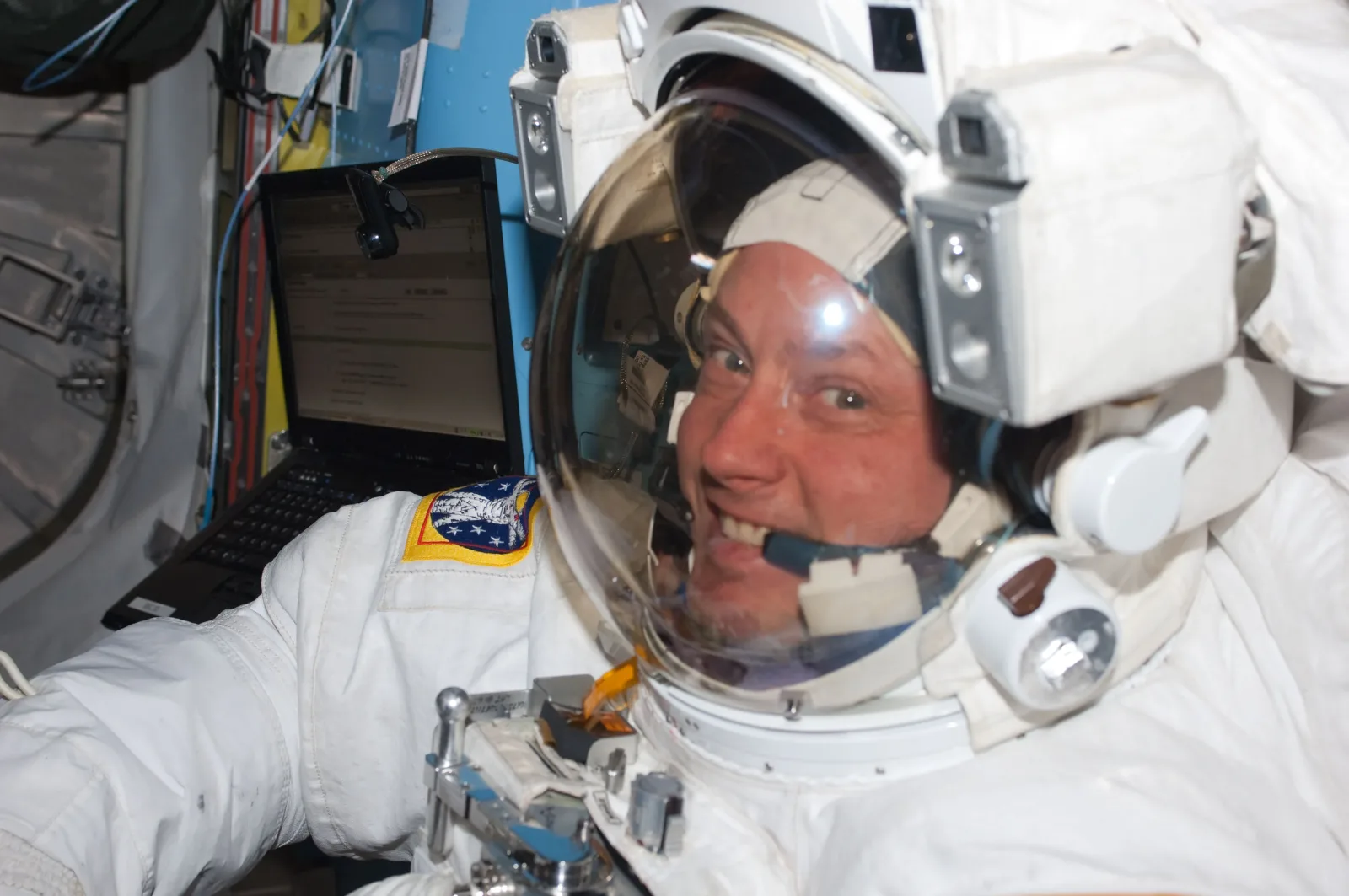 NASA astronaut Mike Fincke is pictured inside the International Space Station’s Quest airlock prior to the start of the third spacewalk for the STS-134 mission.