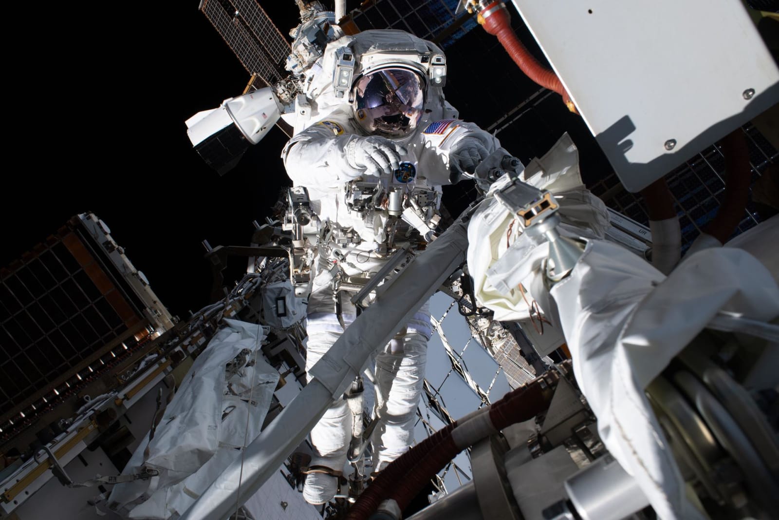 NASA astronaut Anil Menon photographed during his spacewalk outside the ISS on August 6, 2026.