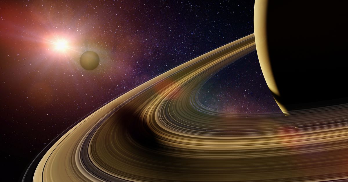 Artist's interpretation of Saturn's moon as it casts a shadow on Saturn's rings. (Cover Image Source: dottedhippo/Getty Images)