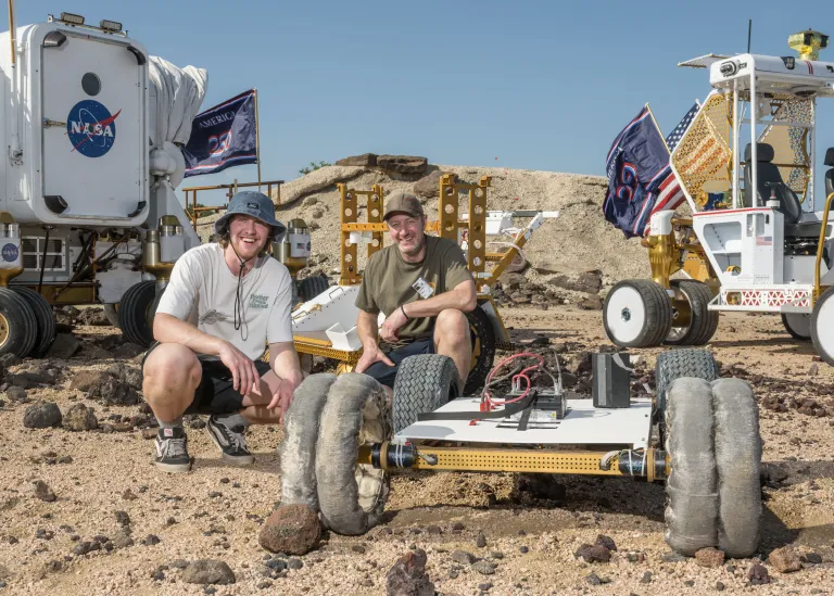 The winning Scotch Pad Tyres team poses with their prototype and MicroChariot at Johnson’s Rock Yard.