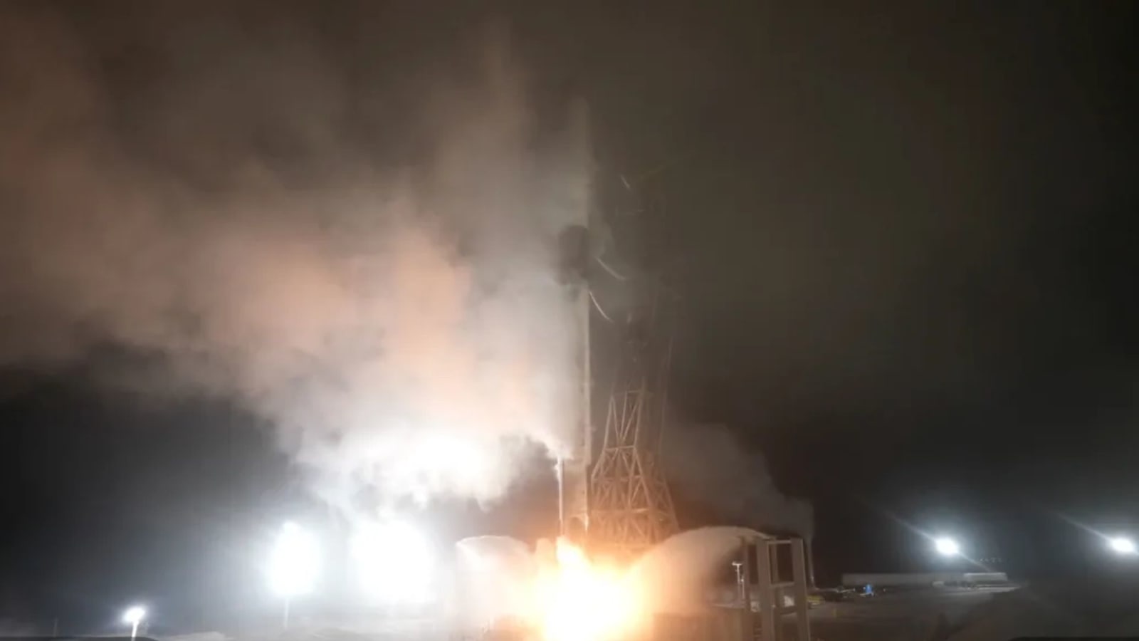 The Falcon 9 rocket ignites its engines as it lifts off with Starlink satellites from  Vandenberg Space Force Base, August 19, 2026.