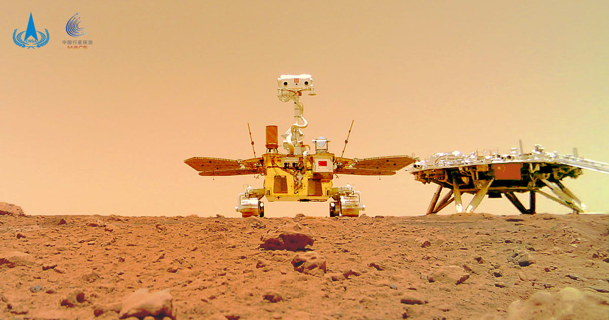 China’s Zhurong rover stands beside its landing platform on Mars in Utopia Planitia. (Image source: China National Space Administration)