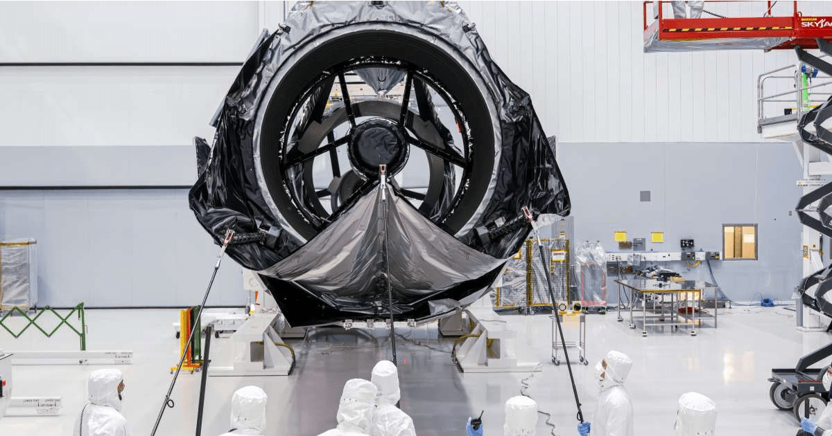 Engineers have a look at Roman’s mirror as its hood is tested at NASA’s Goddard Space Flight Center. (Image Source: NASA | Sydney Rohde)