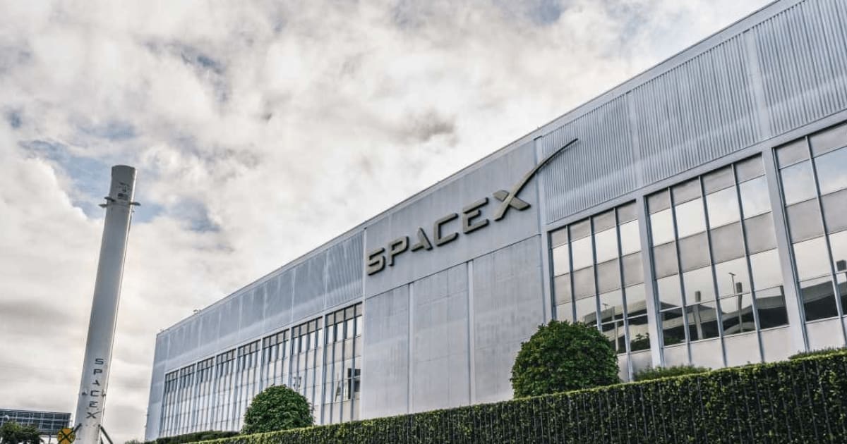 SpaceX (Space Exploration Technologies Corp.) headquarters in Hawthorne, with the Falcon 9 rocket displayed on the left. (Cover Image Source: Getty | Sundry Photography)