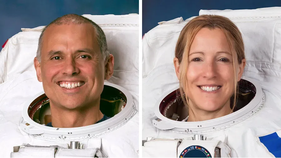 Astronauts Anil Menon of NASA and Sophie Adenot of ESA pose for their official portraits while wearing spacesuits at the Johnson Space Center in Houston, Texas. NASA