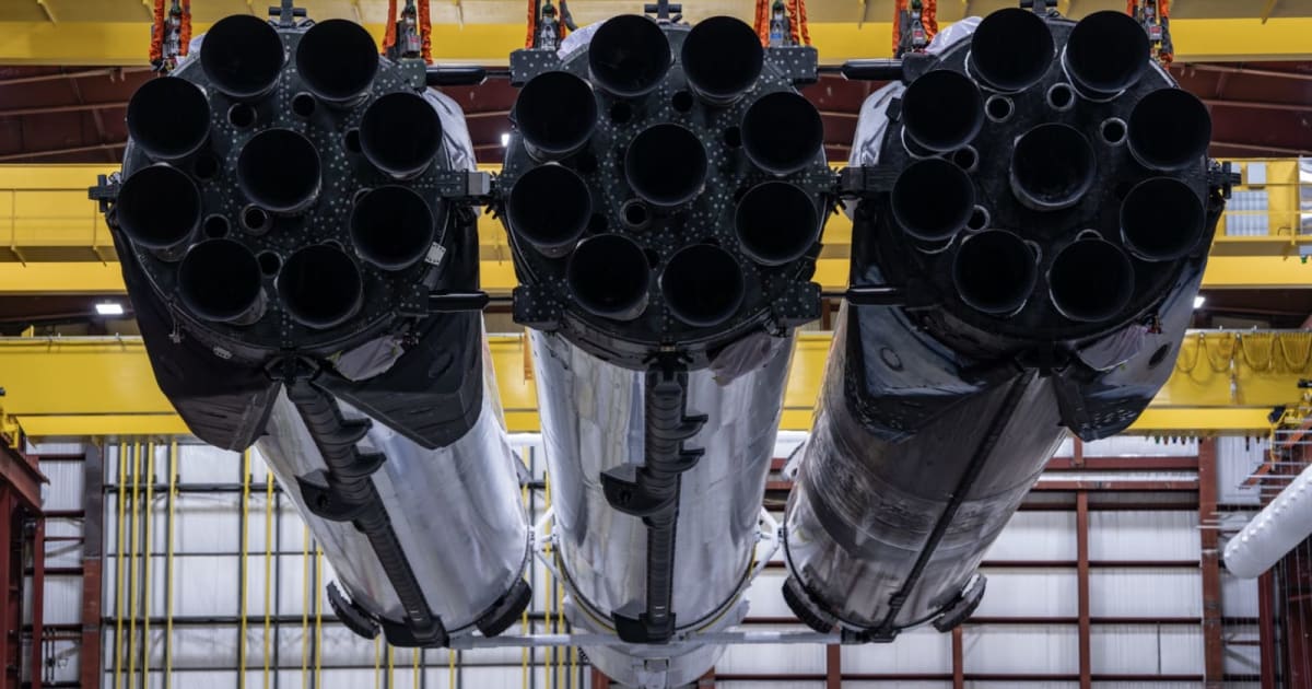SpaceX's Falcon Heavy rocket in the hangar at Launch Complex 39A of NASA's Kennedy Space Center in Florida. (Cover Image Source: SpaceX)