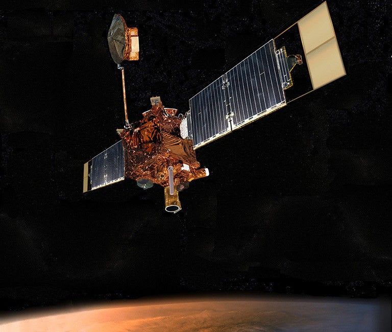 An illustration of NASA's Mars Global Surveyor at Mars.