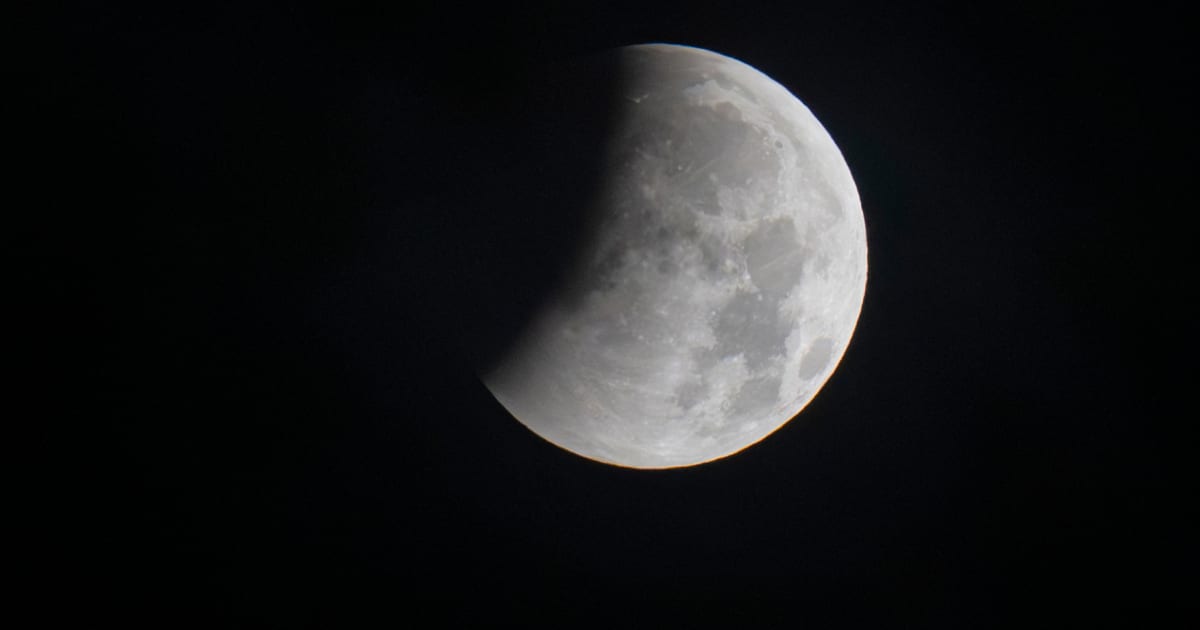 The beginning of a partial lunar eclipse is seen from Munich, Germany, Friday, August 28, 2026. (Cover Image Source: Peter Kneffel/dpa via AP)