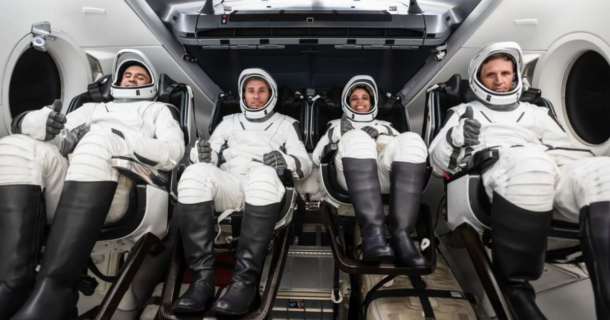 Crew-13 members (from left) Roscosmos Sergey Teteryatnikov, NASA astronauts Luke Delaney and Jessica Watkins, and CSA astronaut Joshua Kutryk seated inside the Crew Dragon spacecraft. (Cover Image Source: SpaceX)