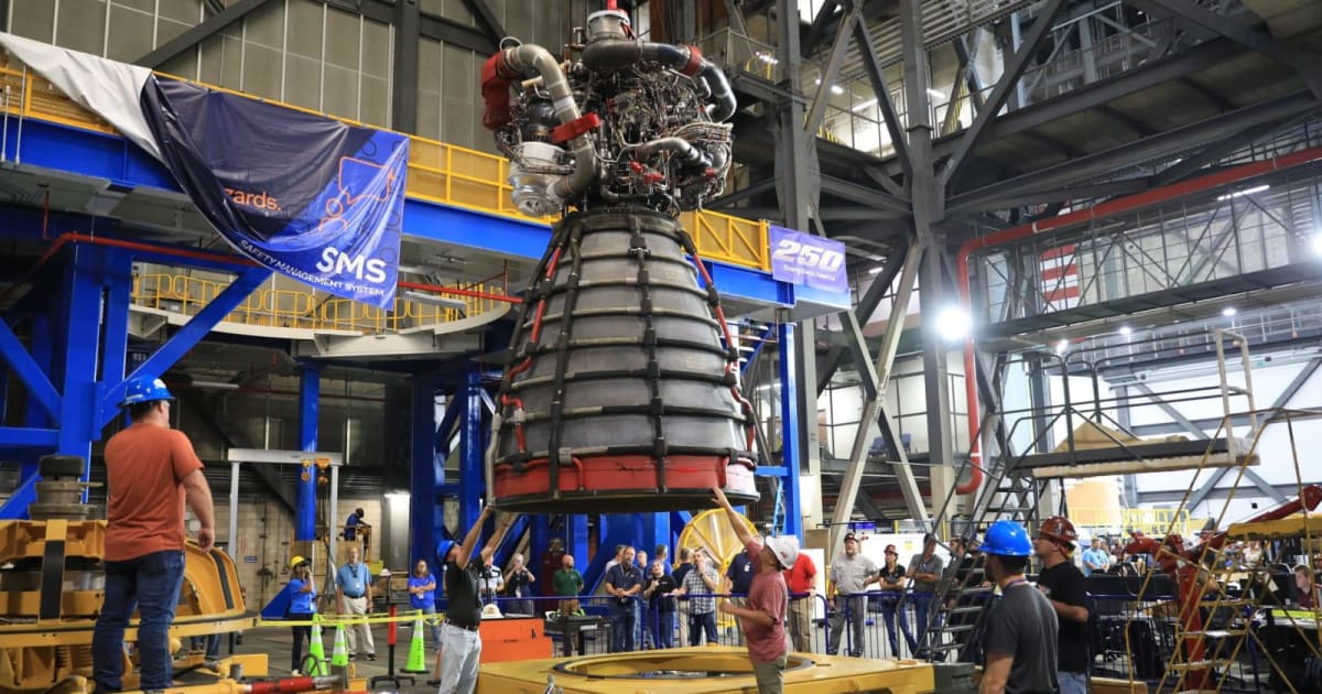 Technicians lift an RS-25 SLS rocket engine to transfer the engine to the work stand to be integrated with the Artemis III core stage. (Cover Image Source: NASA/Clayton Rougelot)