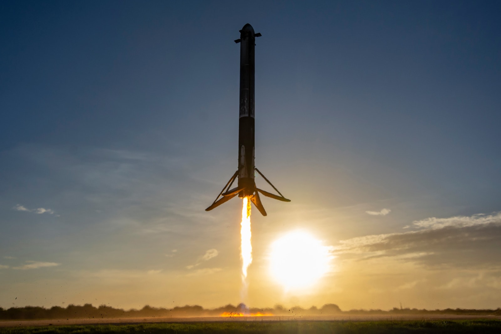 A side booster of the Falcon Heavy rocket attempting a touchdown on the landing zone at Cape Canaveral, Florida.