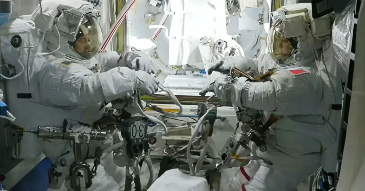 Astronauts Jessica Meir of NASA (left) and Sophie Adenot of ESA are suited up inside the Quest airlock, preparing to exit the International Space Station for a spacewalk. (Cover Image Source: NASA+)