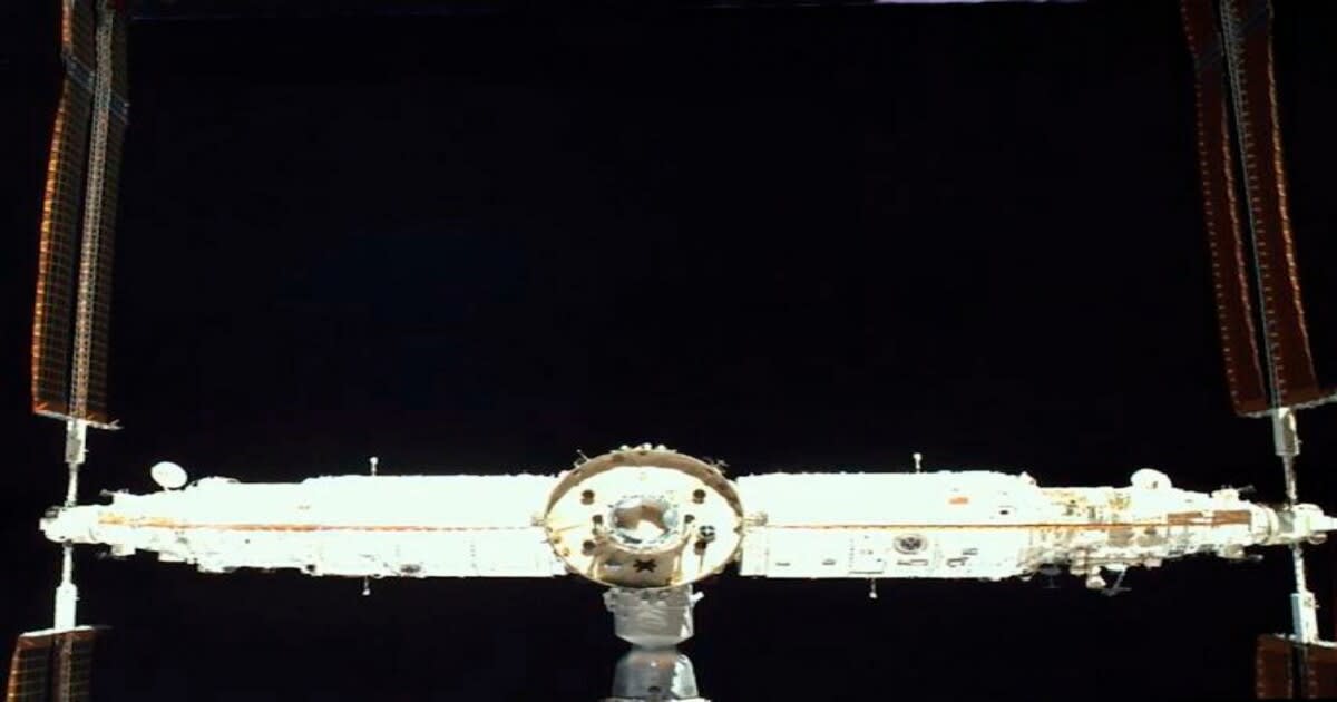 China’s Tiangong space station seen from the rear, with its large solar arrays visible on either side (Image Source: China Manned Space Engineering Office / Wang Xiang, Zhang Qiao and Wang Wei)