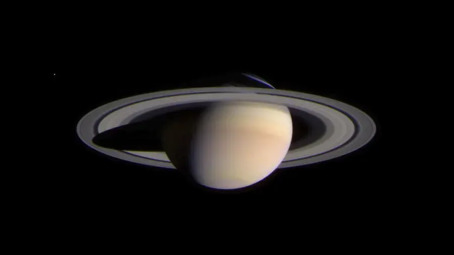 NASA's Cassini spacecraft took this image of Saturn on Feb. 9, 2004, when the spacecraft was about 43 million miles (69 million kilometers) from the ringed planet. The image contrast and colors have been slightly enhanced to aid visibility.