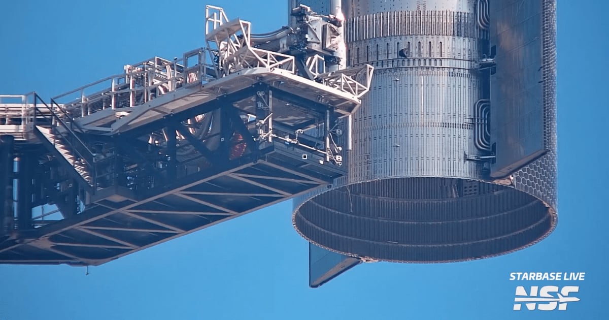 Starship Ship 42 being handled by the chopstick arms at Pad 2's launch tower. (Cover Image Source: NASASpaceFlight)
