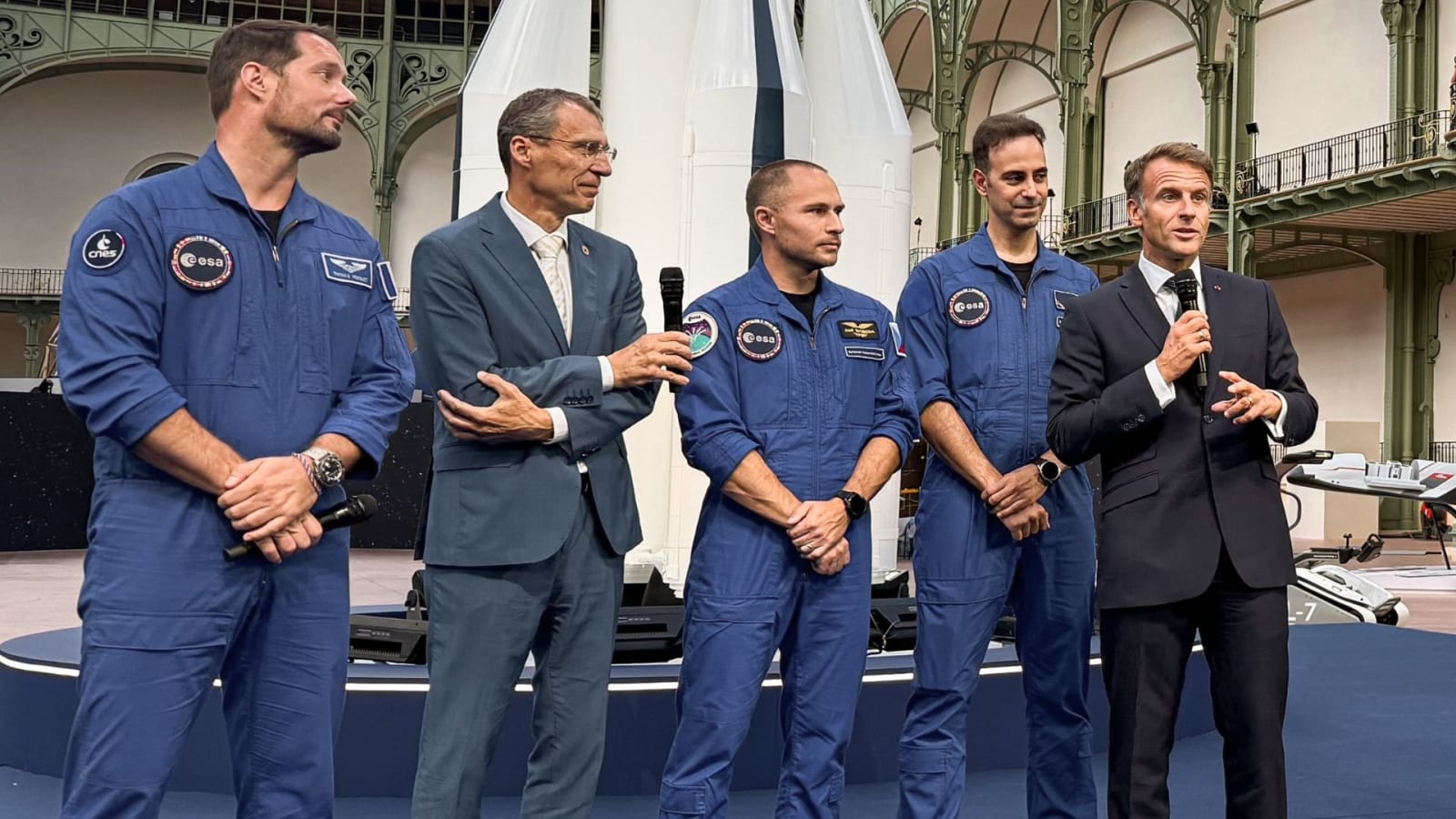 Thomas Pesquet, Aleš Svoboda and Adrianos Golemis (from left in blue) with French President Emmanuel Macron (on the right) at the International Space Summit in Paris.