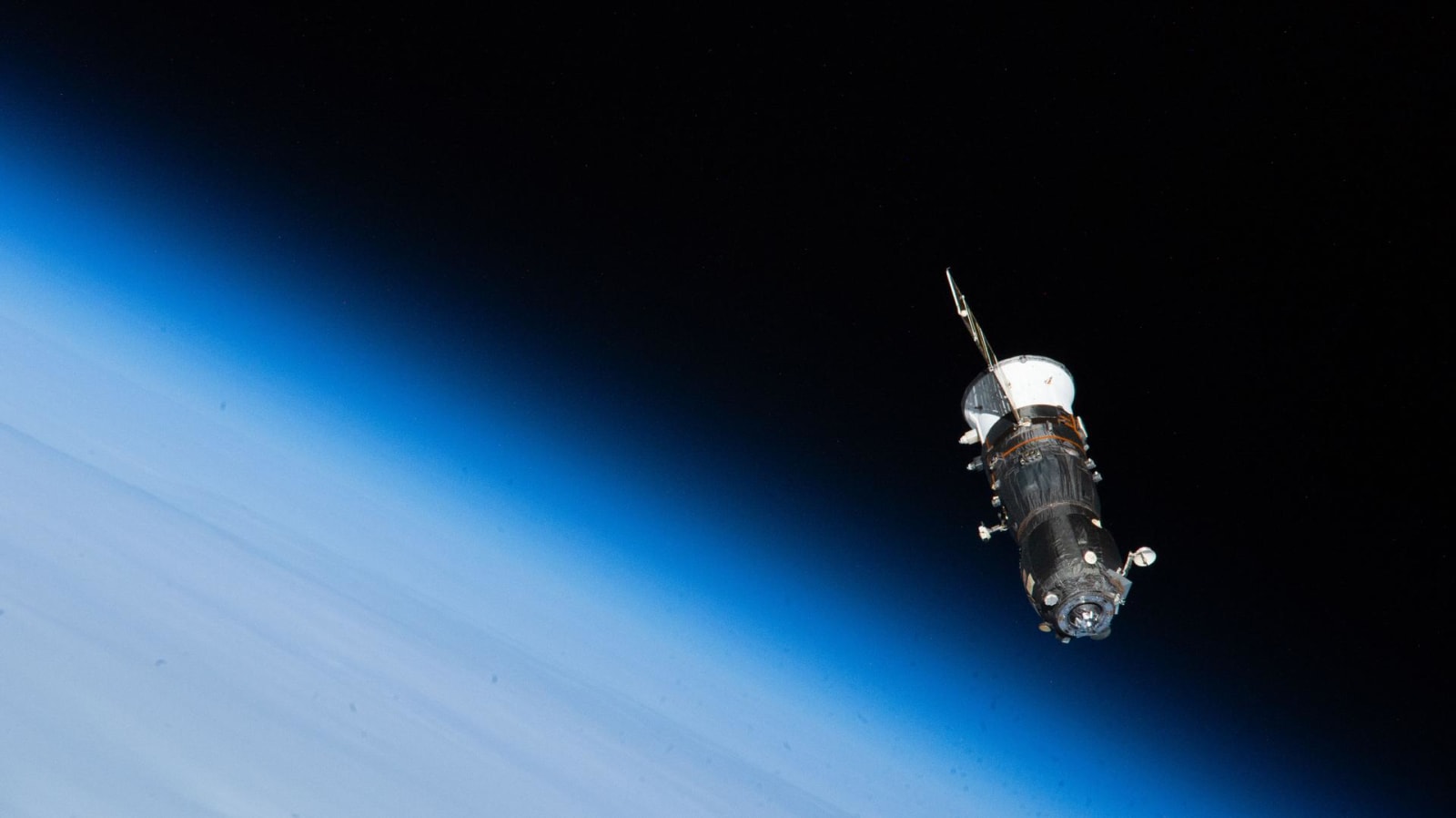 The trash-packed Progress 93 cargo spacecraft from Roscosmos departs the International Space Station on April 20, 2026, after seven months docked to the Zvezda service module’s aft port.