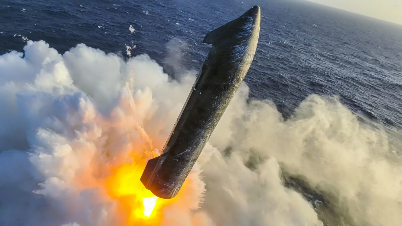 Starship's upper stage firing its Raptor engines for a splashdown in the Indian Ocean on 13th test flight.