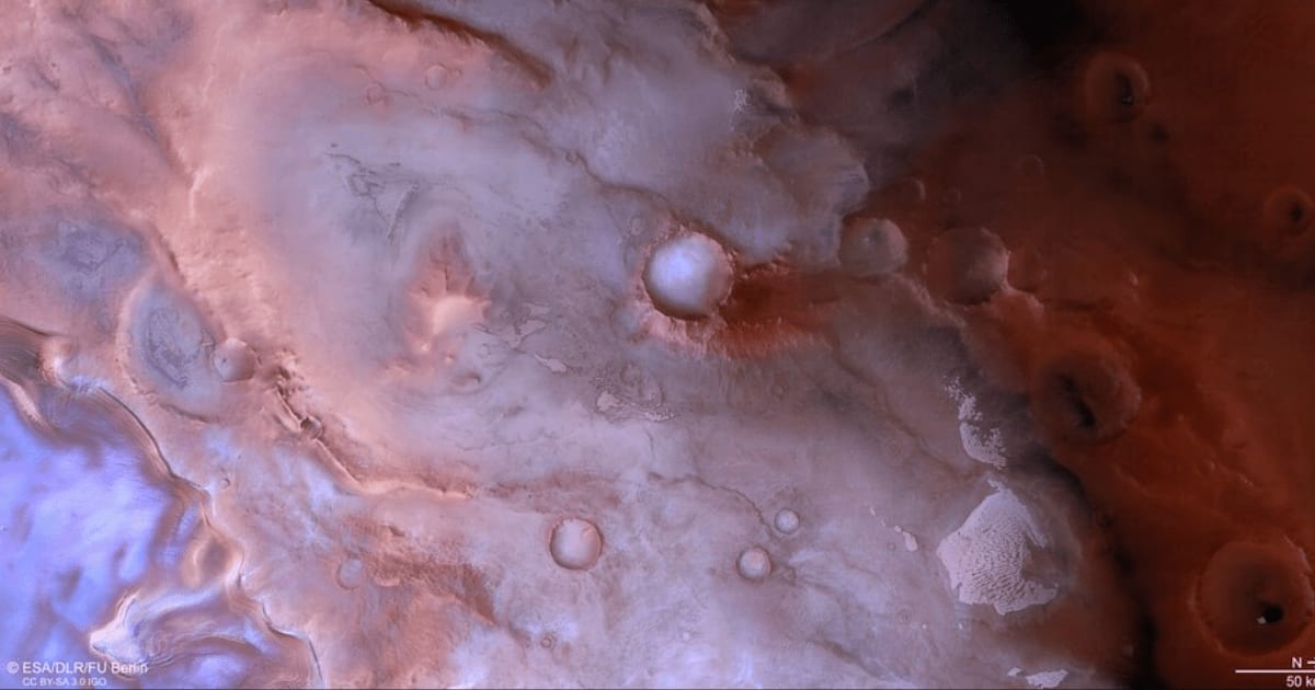 An ice cliff near Mars's south pole. (Representative Cover Image Source: ESA)