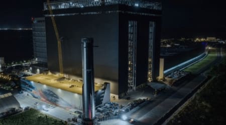 SpaceX moves Super Heavy booster to launch pad ahead of Starship’s historic orbital flight. See photos