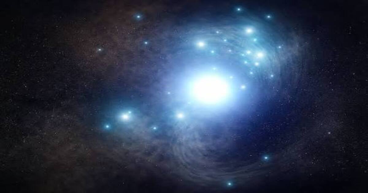 An artist’s concept shows the blue supergiant progenitor star of Type Ic supernova SN 2017ein surrounded by a cluster of young stars. (Image Source: NASA, ESA, and J. Olmsted (STScI))