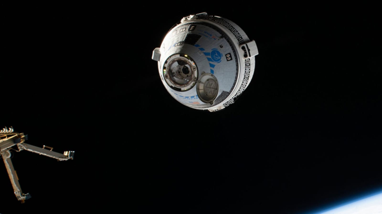 Boeing's Starliner spacecraft approaching the International Space Station for docking.