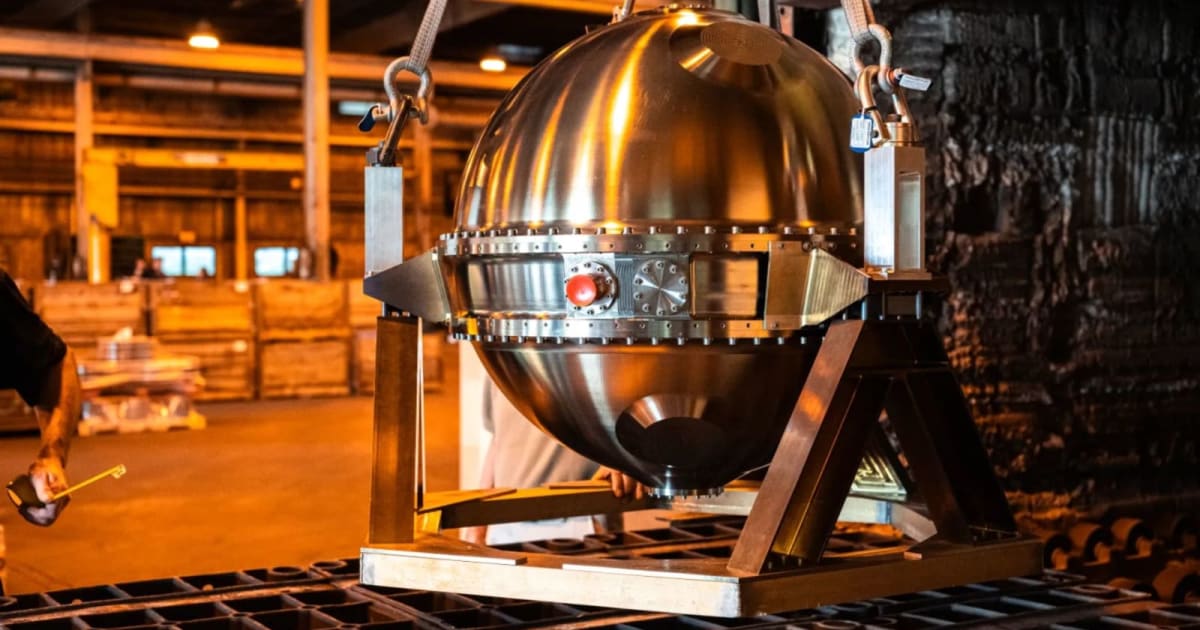 A close-up photo showing the engineering development unit for NASA’s DAVINCI probe at the Rex Heat Treat facility. — (Cover Image Source: NASA/Mike Guinto)
