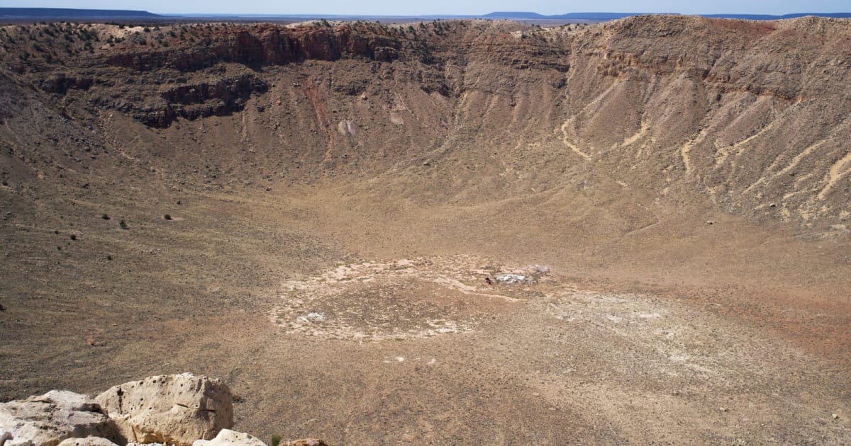 Panoramic view of Meteor Crater in Winslow, Arizona, under a clear sky. (Representative Cover Image Source: Strange Happenings/Pexels)