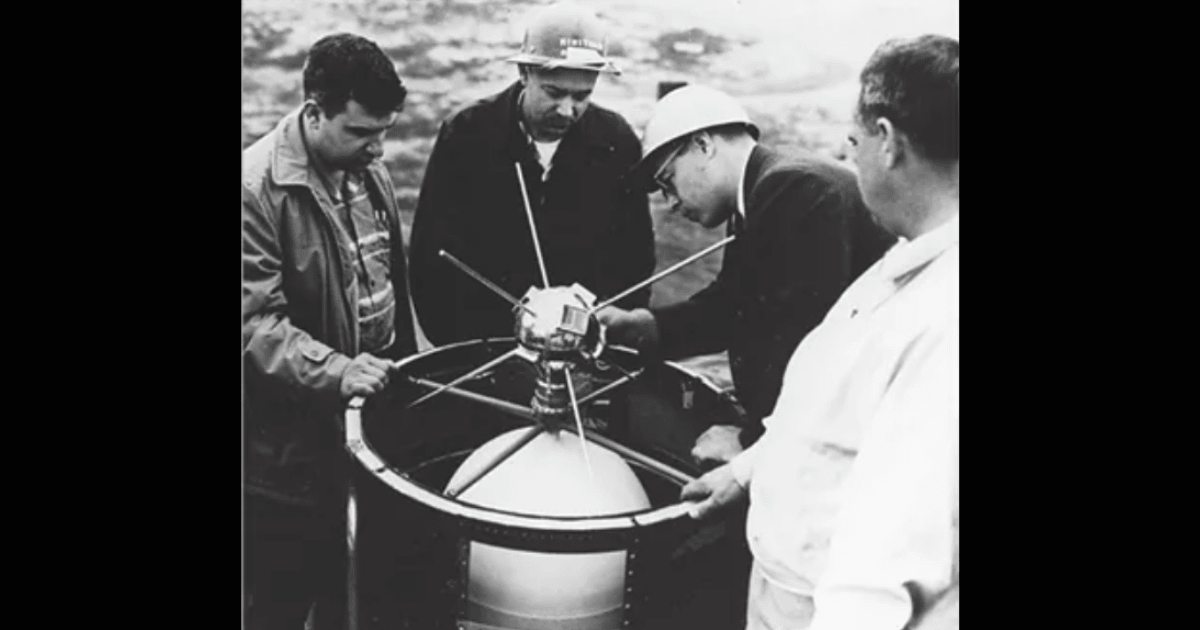 A team working on a Vanguard satellite. (Image Source: US NAVY)